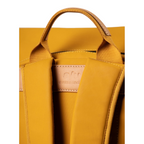 Lieblingstasche a/u by aunts & uncles Fukui backpack in mustard yellow coated canvas with leather details and padded straps