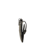 Lieblingstasche purse in a grey patterned finish with a side view showing the zipper and snap button closure