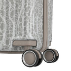 Lieblingstasche grey and white patterned hard-shell trolley luggage with spinner wheels.