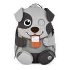 Lieblingstasche Großer Freund dog backpack with grey and dark grey accents, orange tongue, and name tag.