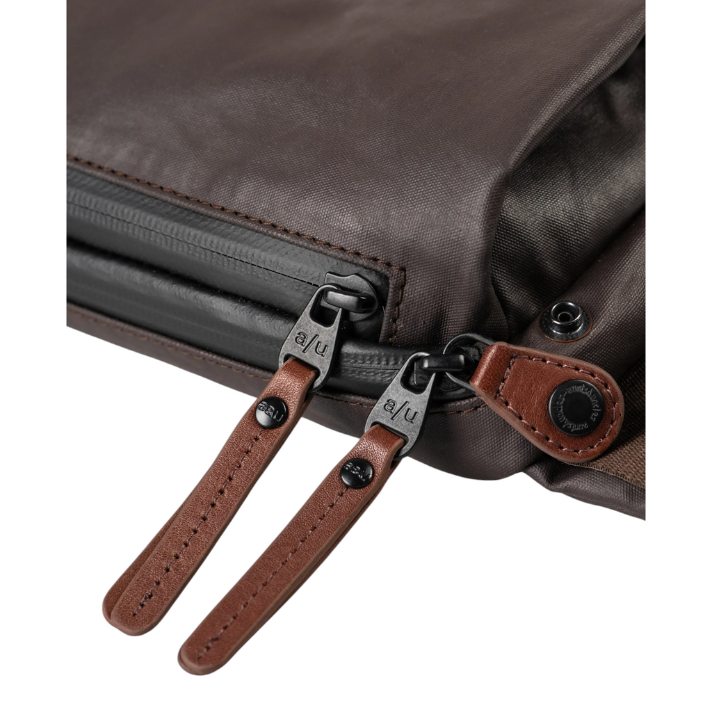 Lieblingstasche Himeji brown bag featuring detailed leather zipper pulls and water-resistant fabric construction.