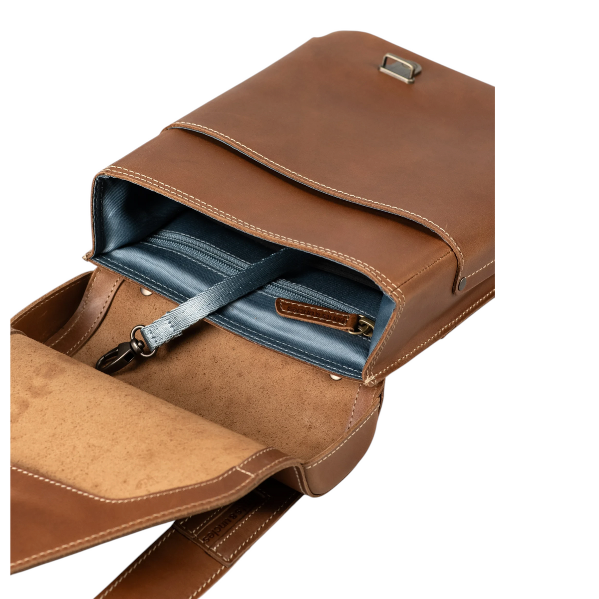 Lieblingstasche Jade brown leather crossbody bag with open flap showing blue fabric interior and zipper pocket