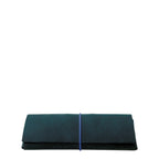 Lieblingstasche Keeper Etui in dark teal leather with a slim blue elastic band closure on a white background.