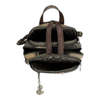 Lieblingstasche backpack in khaki and brown with a multi-compartment design and patterned interior lining