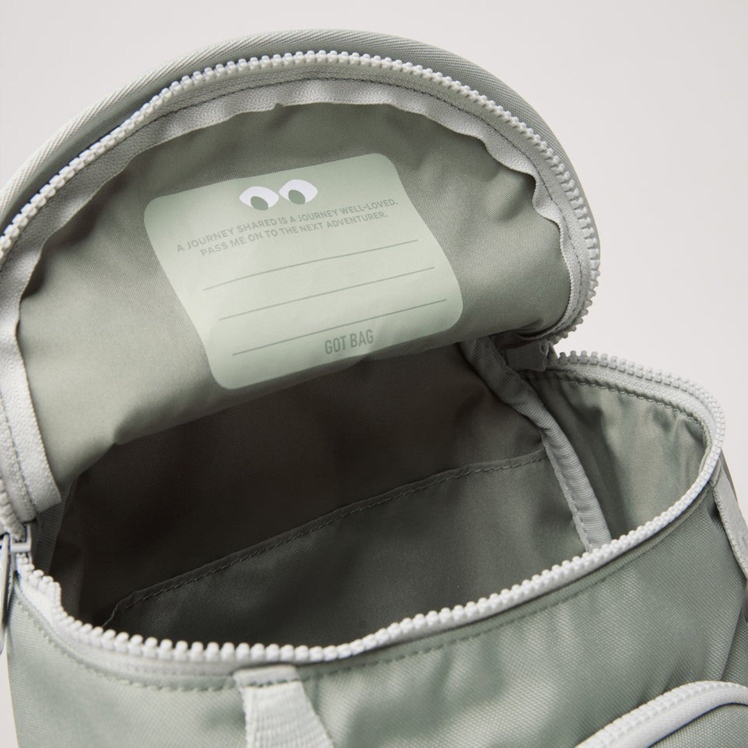 Lieblingstasche Kids Adventure Daypack interior view with name tag label in sage green recycled plastic fabric