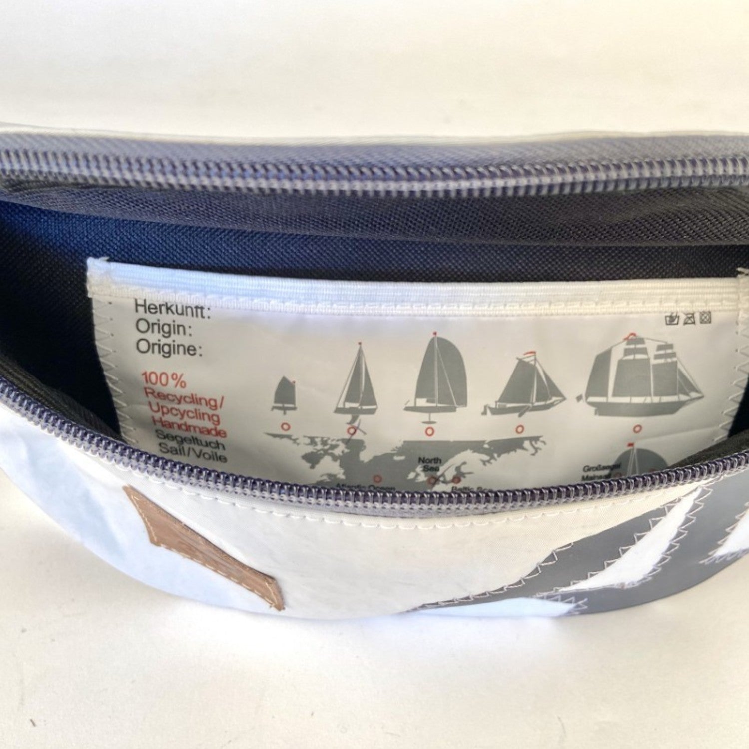 Lieblingstasche Knoten belt bag made from recycled white and grey sailcloth with interior origin label
