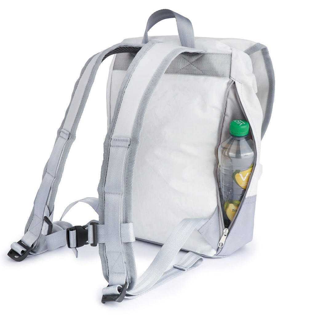 Lieblingstasche Landgang Mini backpack in white with grey straps and a side pocket holding a water bottle
