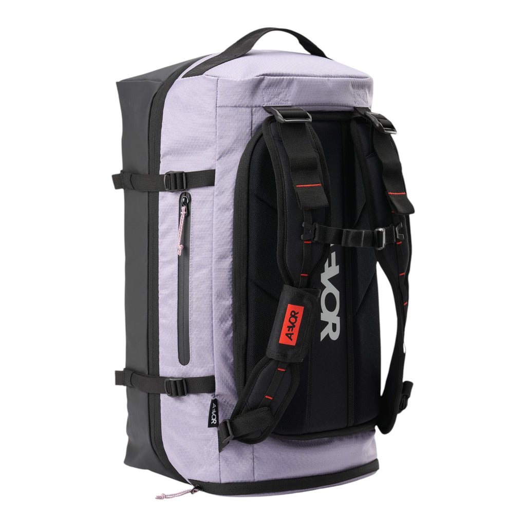 Lieblingstasche lavender and black duffel pack with adjustable shoulder straps and side compression buckles
