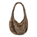 Lieblingstasche Moonbag in a brown and black leopard print faux fur with a soft slouchy crescent shape