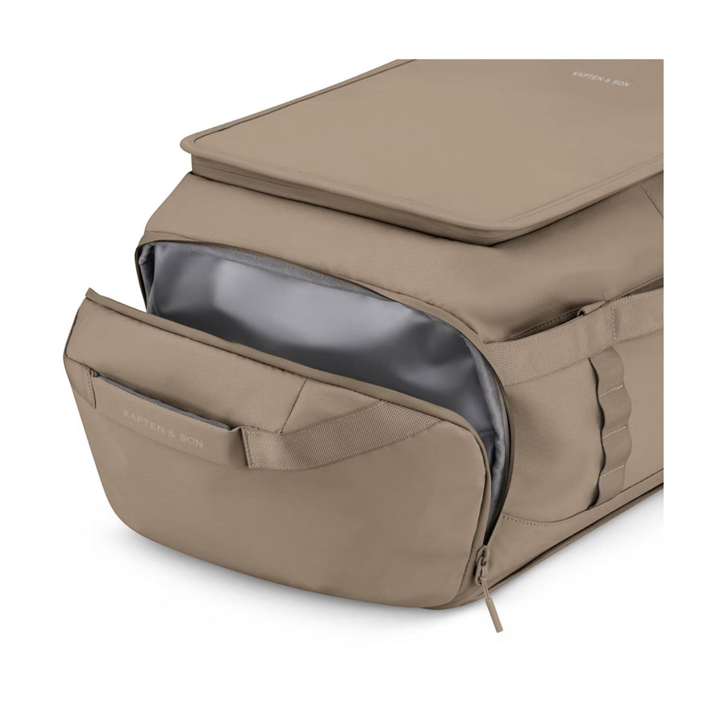 Lieblingstasche Lisbon Duffle Backpack L in beige with a partially open side compartment and durable fabric.