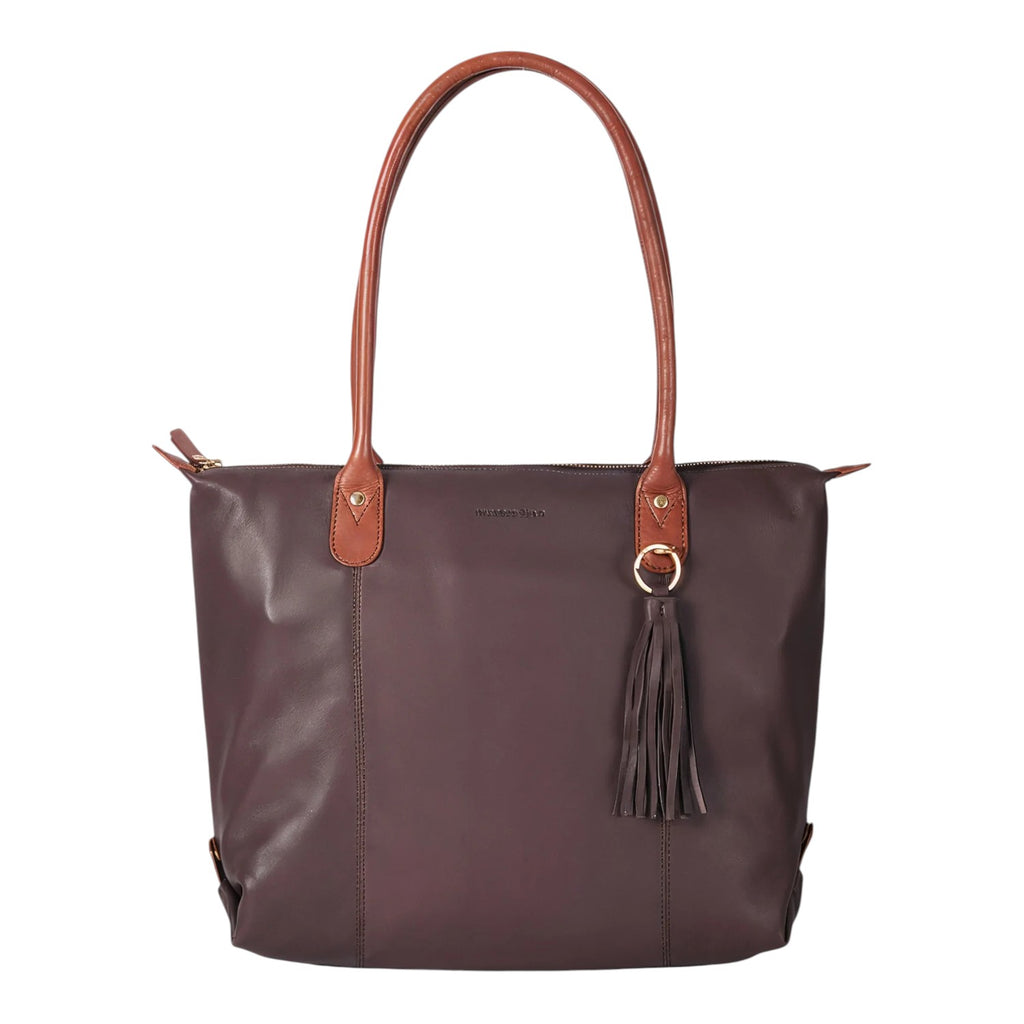 Lieblingstasche Lucia L tote bag in deep plum leather with tan leather straps and tassel detail.