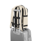 Lieblingstasche eoto Midi20 beige city backpack with trolley sleeve attached to a silver suitcase handle