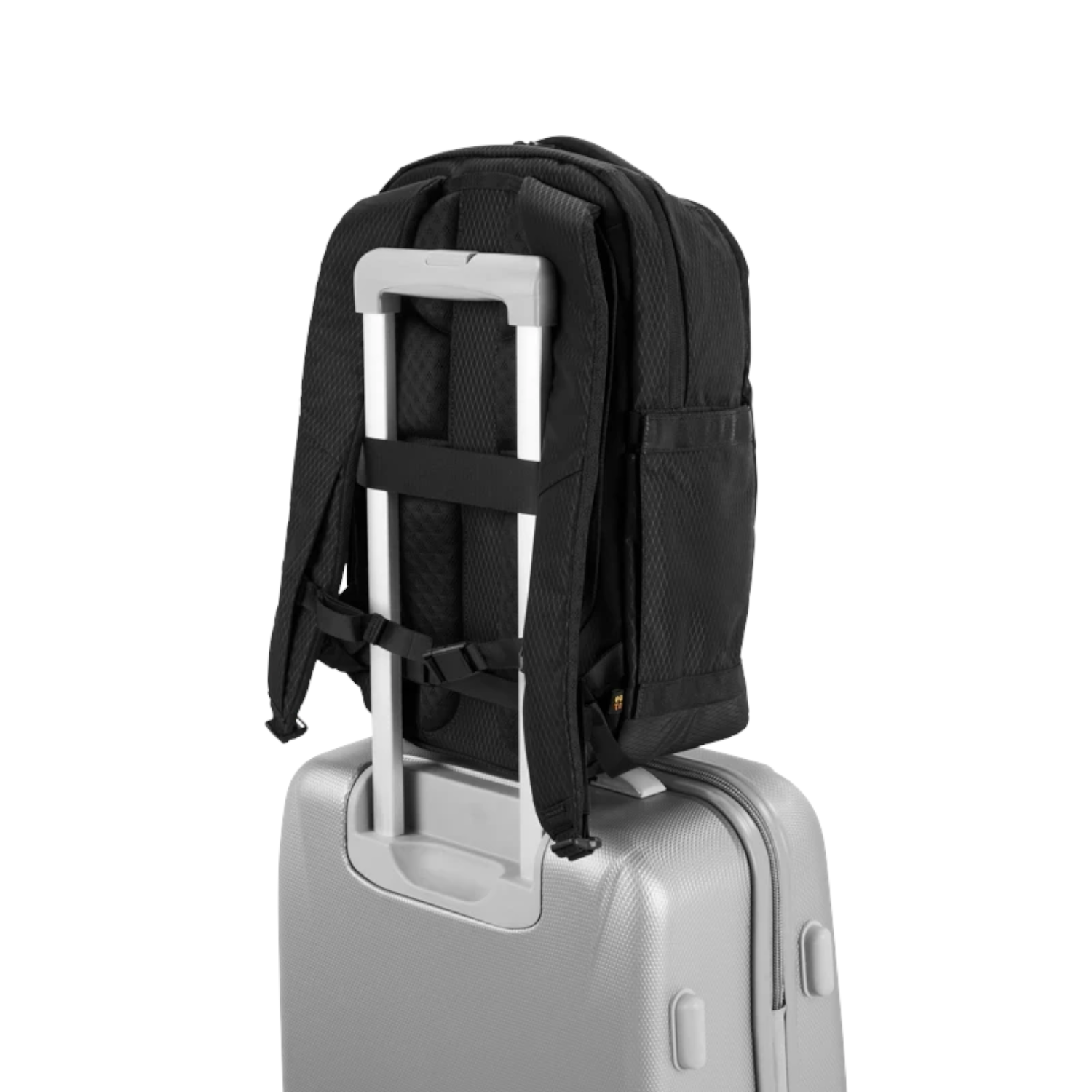 Lieblingstasche Midi20 black city backpack attached to a silver suitcase handle showing the padded back panel