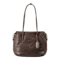 Lieblingstasche Mrs. Florentine dark brown leather shoulder bag with long straps and a decorative leather tag