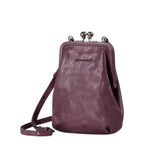 Lieblingstasche Mrs. Sugar Pop purple leather crossbody bag with a vintage-style kiss-lock clasp closure.