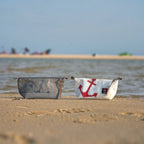 Lieblingstasche Navigator anchor print toiletry bags made from recycled sailcloth on a sandy beach