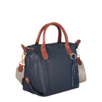 Lieblingstasche Lucia M navy blue leather handbag with tan leather handles and tassel detail.