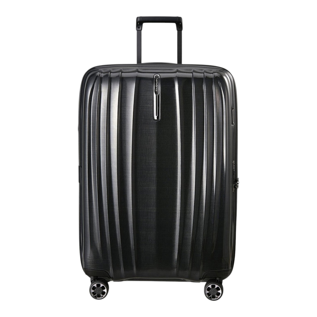 Lieblingstasche NEXIS Spinner 76/28 Exp black hard-shell suitcase with vertical ridges and telescopic handle