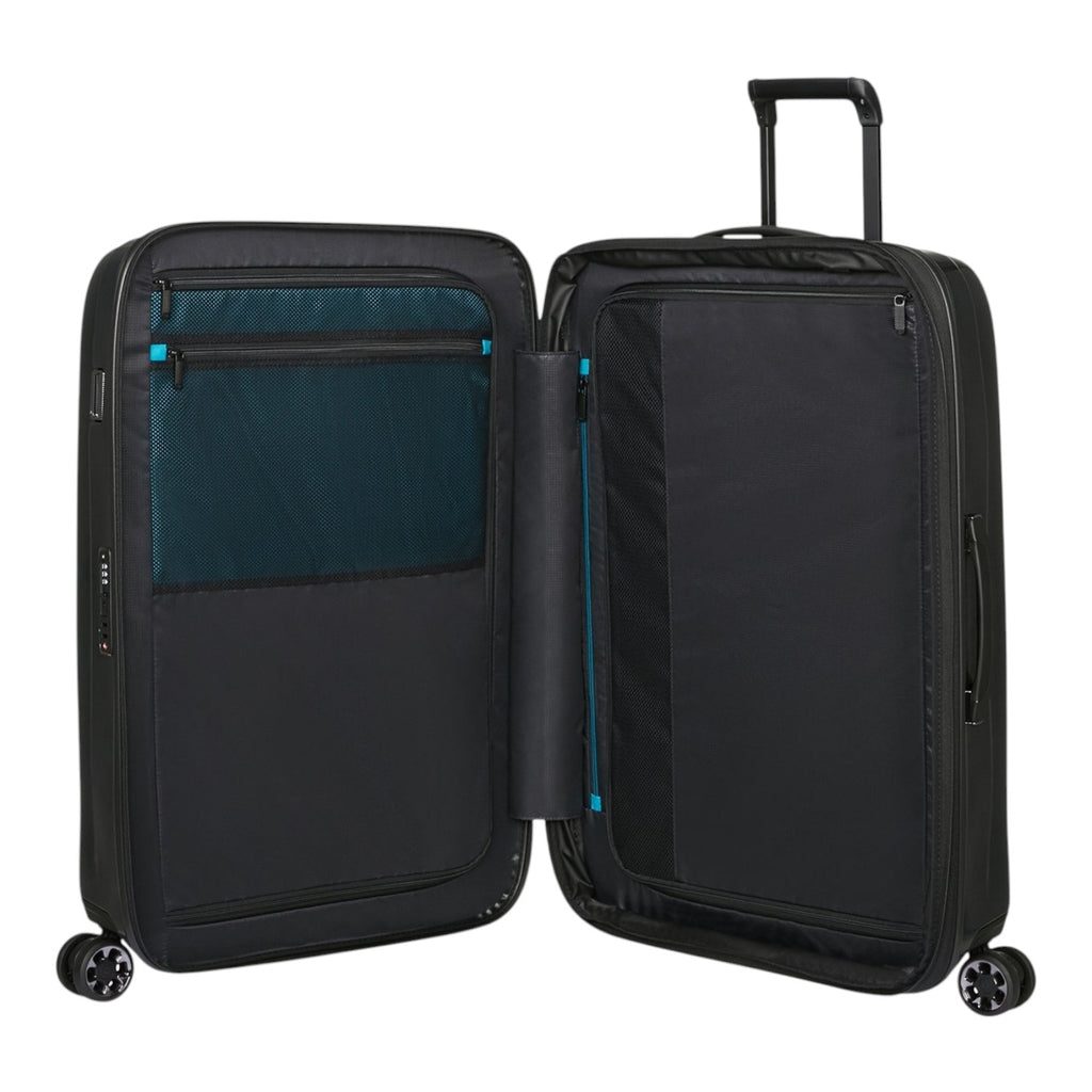 Lieblingstasche NEXIS Spinner 70/26 Exp suitcase open showing black interior with mesh pockets and blue accents