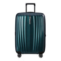 Lieblingstasche NEXIS Spinner 76/28 Exp suitcase in dark teal with a ribbed hard shell and four spinner wheels.