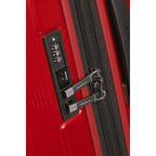 Lieblingstasche NUON Spinner 75/28 suitcase featuring a red hardshell exterior and integrated TSA combination lock.