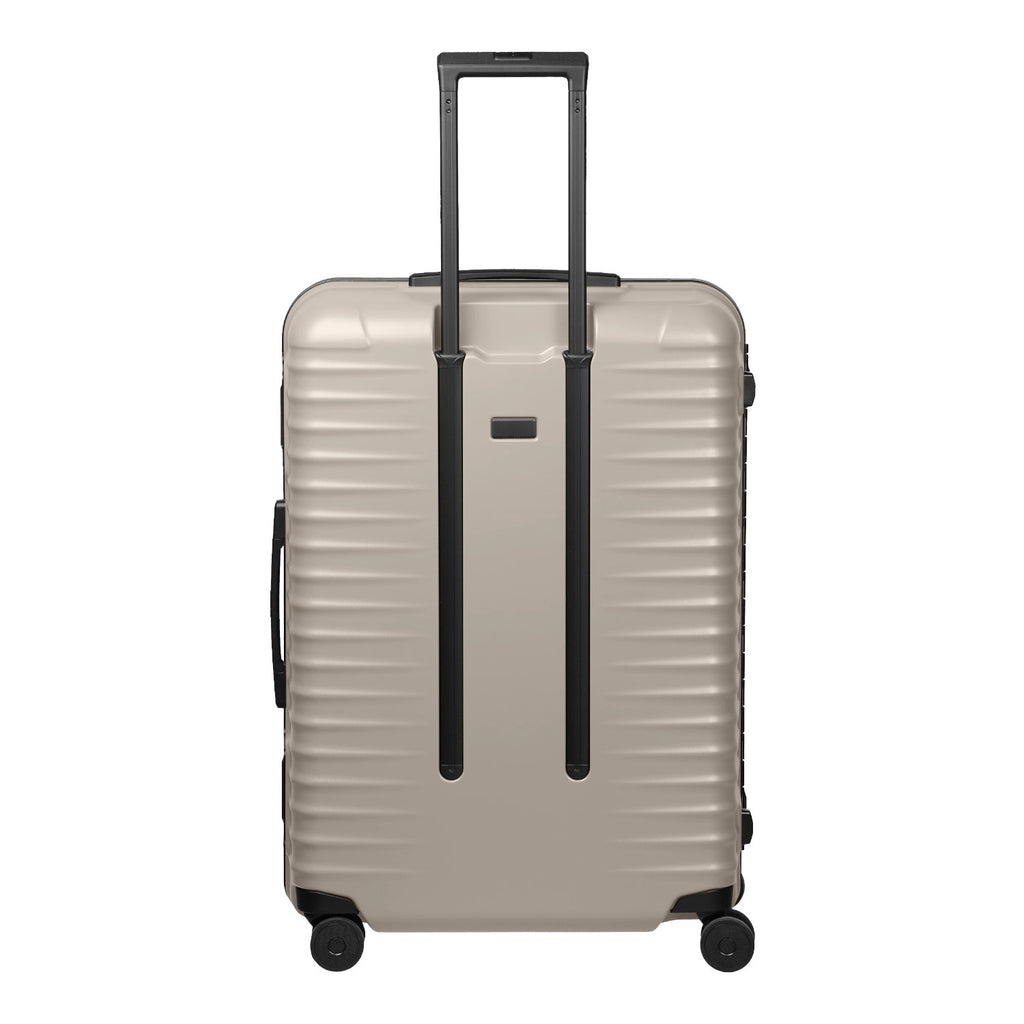 Lieblingstasche OVERSEAS 4w Trolley L in beige with a ribbed hard shell and black telescopic handle