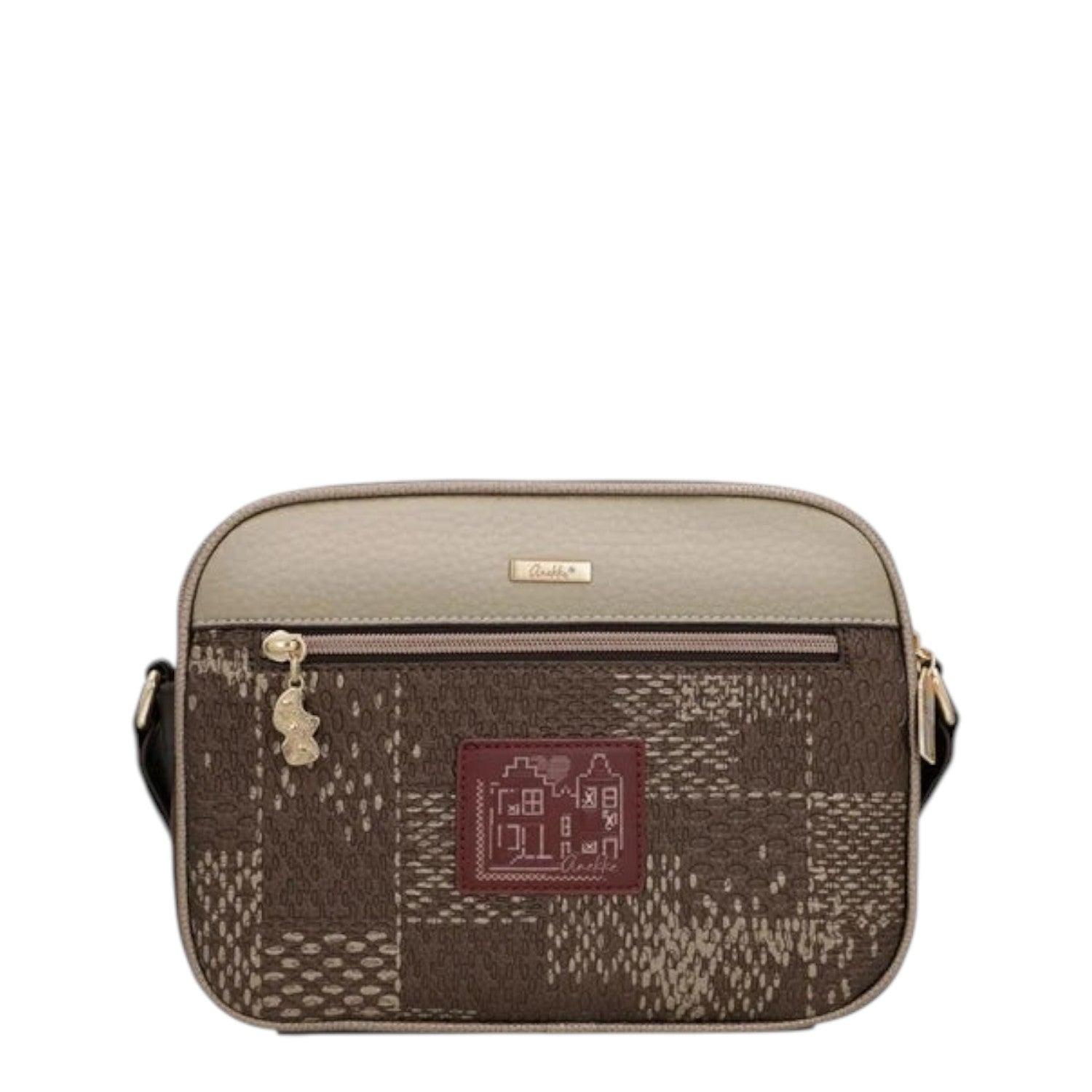Lieblingstasche cross-body bag in beige and brown with a patterned patchwork design and a small house logo patch.