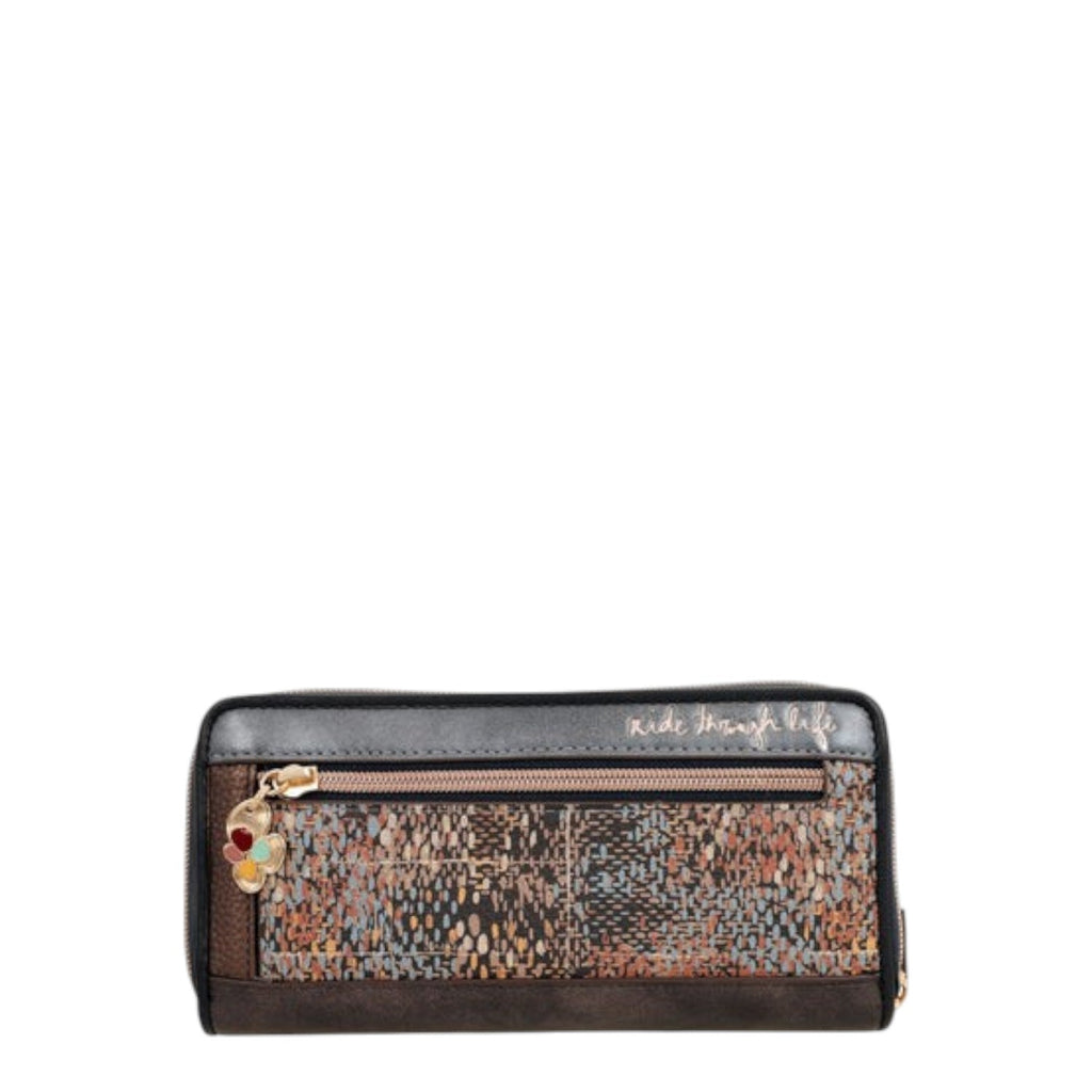 Lieblingstasche wallet featuring a multi-colored patterned design, front zip pocket, and decorative floral charm