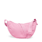 Lieblingstasche Cloud Moon Bag Small in light pink with a crescent shape, adjustable strap, and zippered closure.