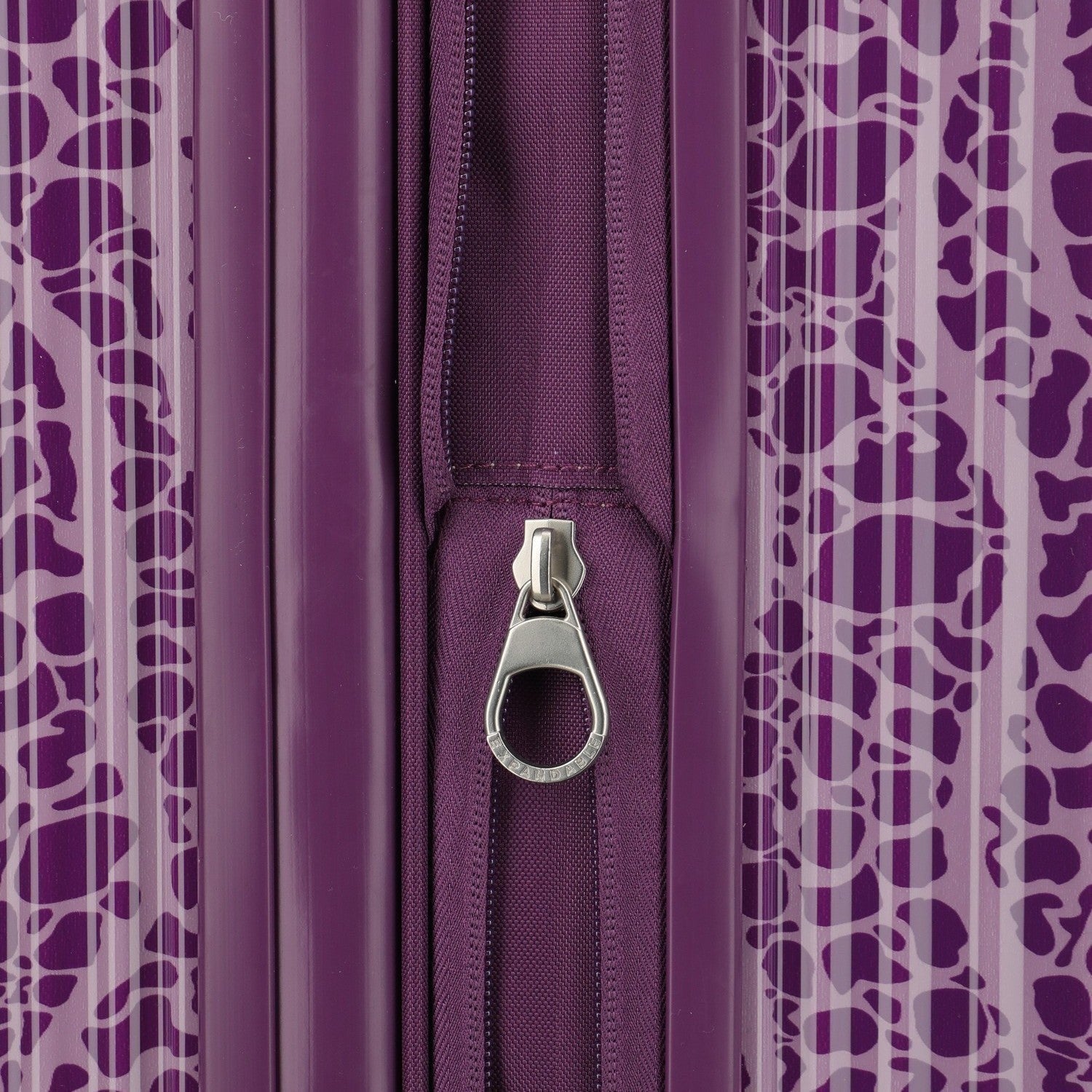 Lieblingstasche purple trolley with a subtle animal print and silver zipper detail.