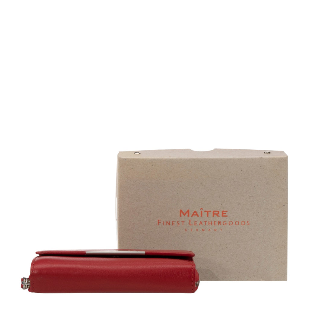 Lieblingstasche red leather coin purse with silver clasp and zipper detail, presented with its box.