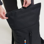 Lieblingstasche Rolltop Easy backpack in black with a zipper closure and colorful accent detail on the front pocket