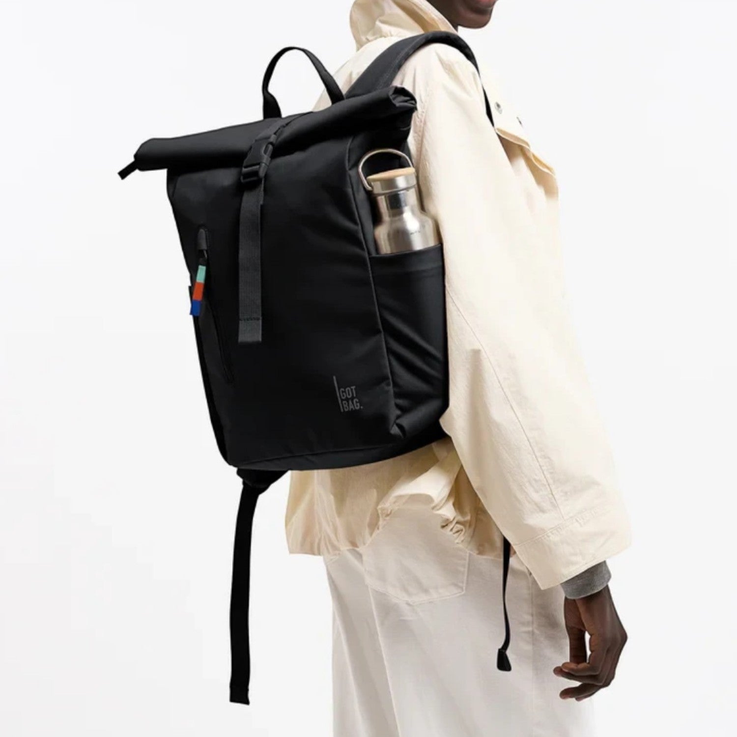 Lieblingstasche Rolltop Easy Small black backpack with water-resistant design, side bottle pocket, and ergonomic straps.