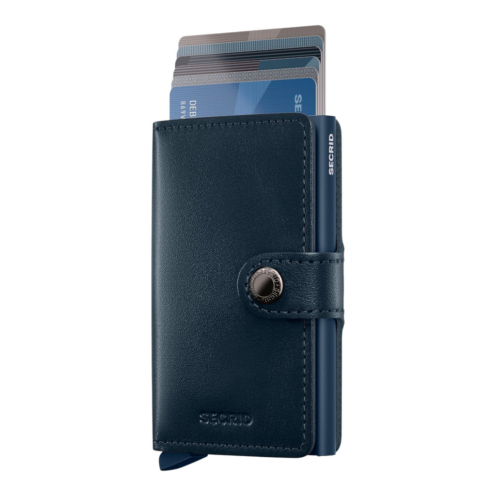 Lieblingstasche Secrid Miniwallet Original in navy blue leather with an aluminium card protector and snap button.
