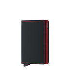 Lieblingstasche Secrid Slimwallet in matte black leather with red stitching and a red metallic card protector.