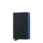 Lieblingstasche Secrid Slimwallet in matte black leather with blue stitching and a metallic blue card protector.