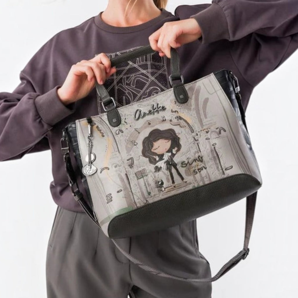 Lieblingstasche short handle bag featuring a whimsical illustrated character design in grey and black tones