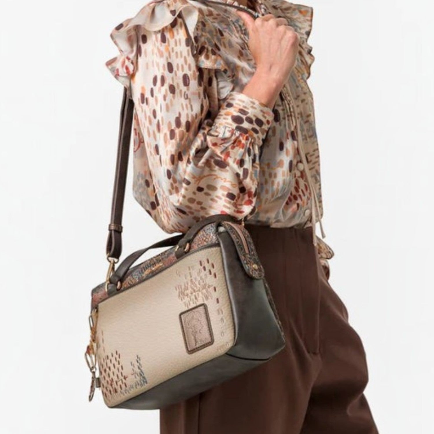 Lieblingstasche short handle bag in beige and brown with patterned textured leather worn over the shoulder