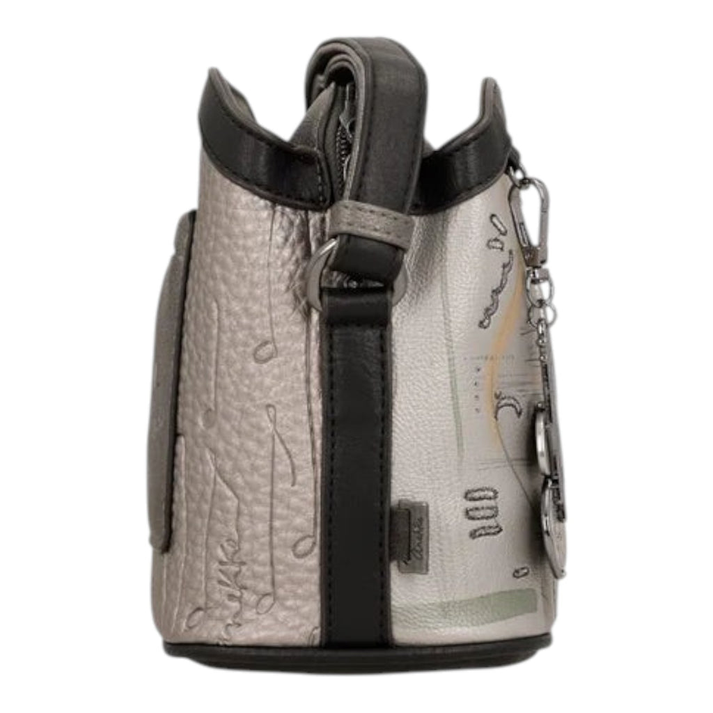 Lieblingstasche cross-body bag in metallic silver with black trim and unique musical note print side view