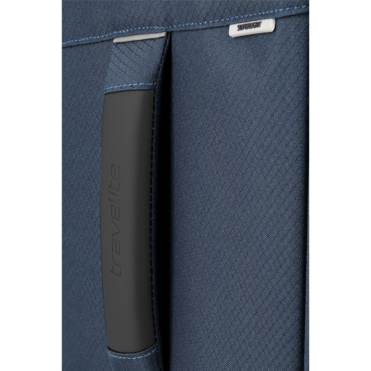 Lieblingstasche Skaii trolley suitcase in blue featuring a durable textured fabric and a black rubberized handle