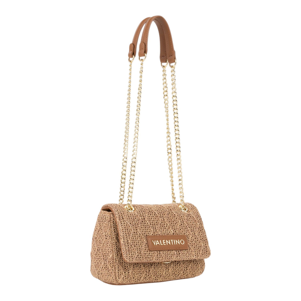 Lieblingstasche Ocarina flap bag in woven straw with brown leather trim and gold chain strap.
