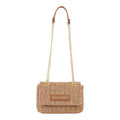 Lieblingstasche Ocarina Summer flap bag in woven straw with gold chain strap and leather trim.