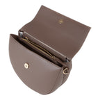 Lieblingstasche taupe leather flap bag with gold hardware and zipper closure. Open view showing interior.