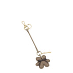 Lieblingstasche Teddy Charm bag accessory in taupe felt with a dark brown bow and gold-tone hardware