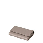 Lieblingstasche Thyme wallet in taupe leather with a fold-over flap and embossed logo detail