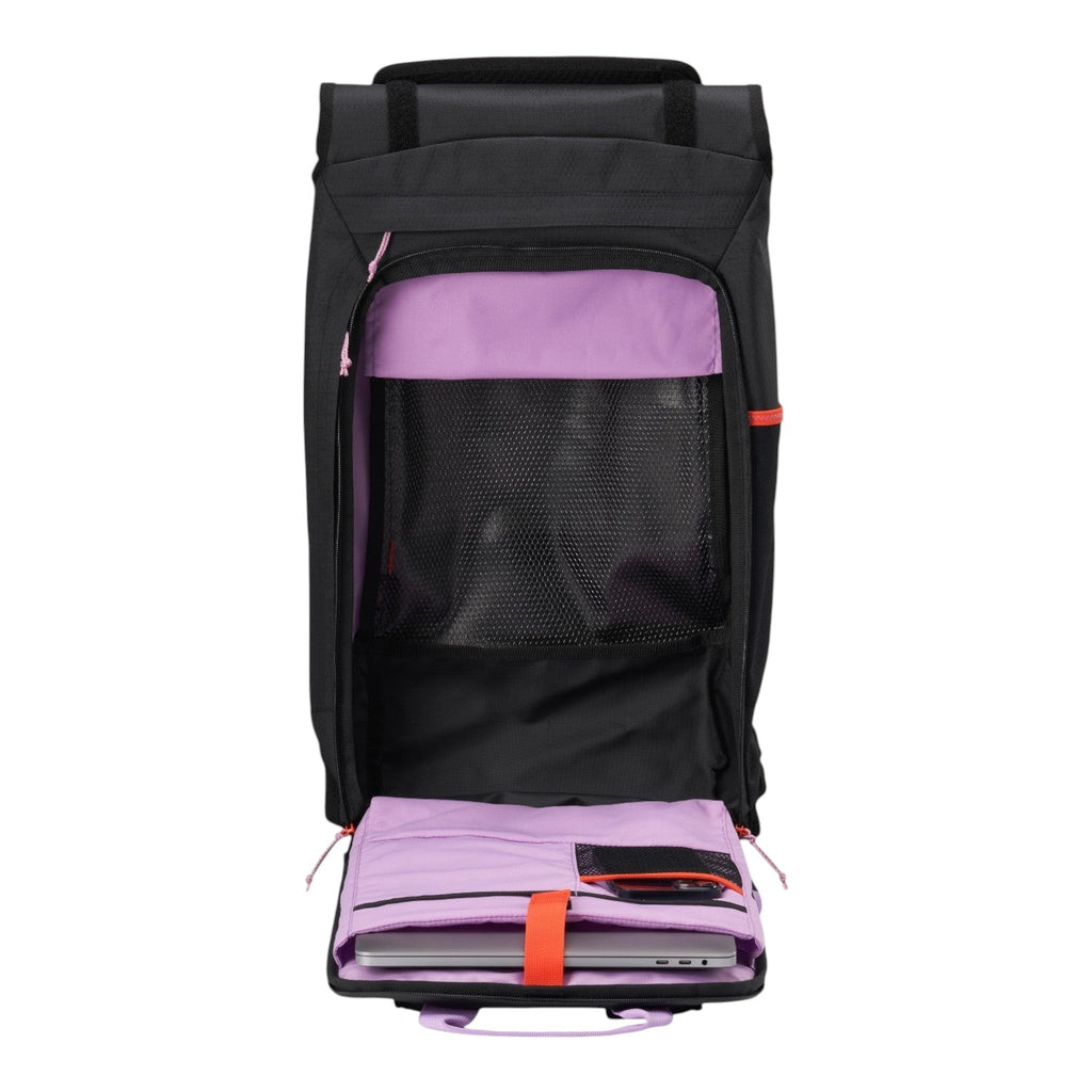 Lieblingstasche Trip Pack black travel backpack with open main compartment, purple lining, and laptop sleeve.