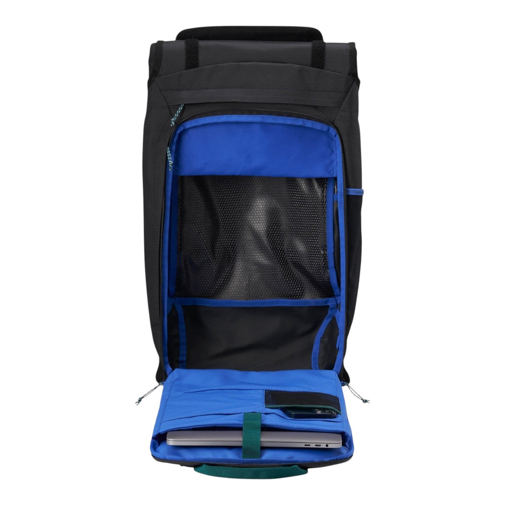 Lieblingstasche Trip Pack black backpack with open main compartment, bright blue interior lining, and laptop sleeve.