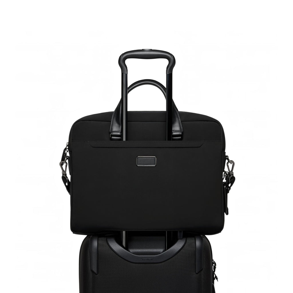 Lieblingstasche Tumi Harrison Avondale black nylon top zip briefcase mounted on a rolling suitcase handle