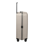 Lieblingstasche UPGRADE 4w Trolley L in beige with a ribbed hard shell design and black telescopic handle