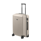 Lieblingstasche UPGRADE 4w Trolley M in beige with a hard shell, telescopic handle, and four spinner wheels.